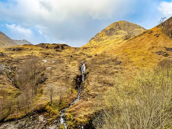 stock image The Mountains of Glencoe with a Waterfall