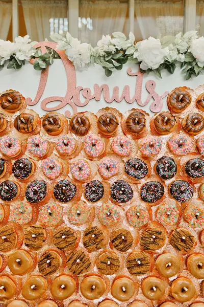 stock image Sprinkle donuts display at wedding, chocolate iced