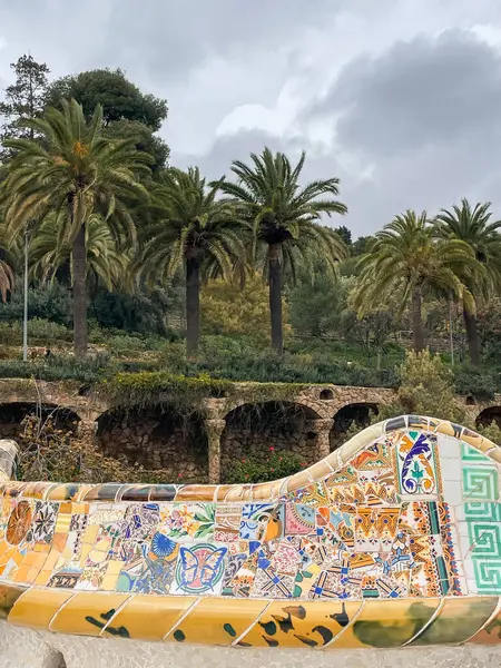 Stock image Mosaic bench in Gaudi's Park Guell in Barcelona  Spain on cloudy day.