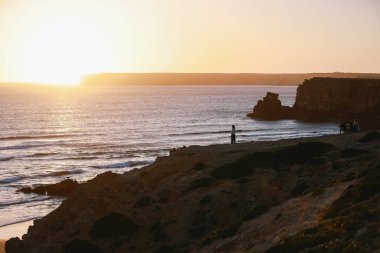 İstanbul, Sagres, Algarve, Portekiz 'de günbatımının tadını çıkarıyor.