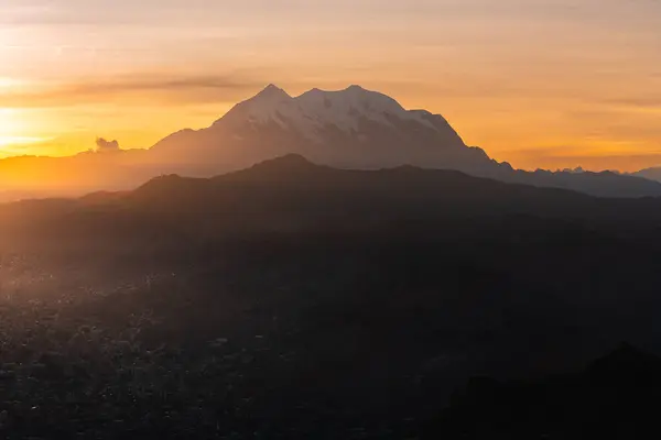 stock image Illimani with the city of La Paz in Bolivia during the golden hour