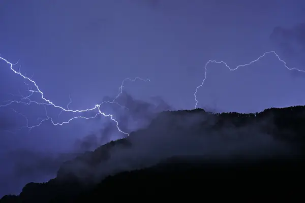 stock image Lightning strikes in the mountains