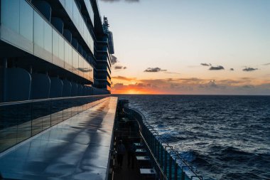 Sunset View on the Ocean from a Cruise Ship clipart