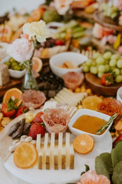 Close up of Colorful Charcuterie Table with Fruits and Meats clipart