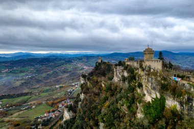 San Marino Falesia and Montale towers drone view on a cloudy day clipart