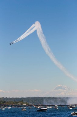 Blue Angels flying over lake Washington at Seafair 2024 clipart