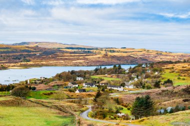 Picturesque Scottish Town on a Loch clipart