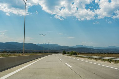 Rural road in the countryside of Georgia clipart