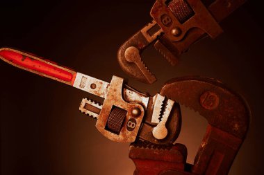 Rusty antique tools (pipe wrenches) clipart