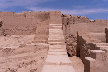 A large stone building with a staircase leading up to it clipart