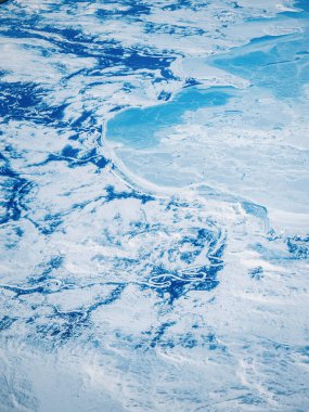 Above view of Greenland coastline in winter clipart