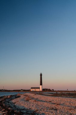 Günbatımında deniz feneri, Saare County, Estonya