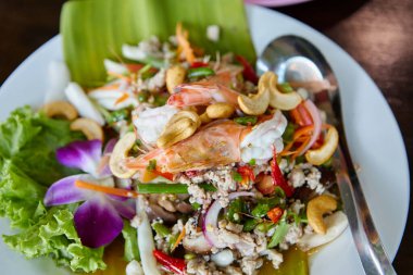 Close-up view of spicy shrimp and minced pork salad clipart