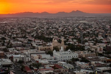 Overview of Hermosillo, Sonora, Mexico at sunset clipart