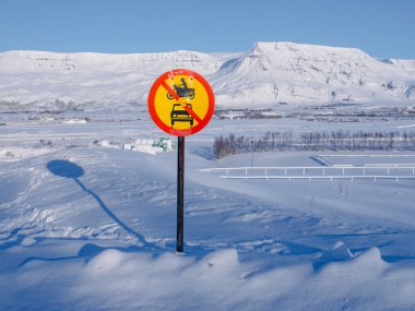 No heavy machinery warning sign in snowy landscape clipart