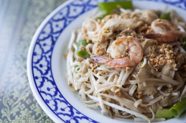 A fresh shrimp dish sits on a table at a Thai restaurant. clipart