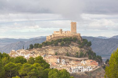 Landscape of the town and castle of Biar in the province of Alic clipart