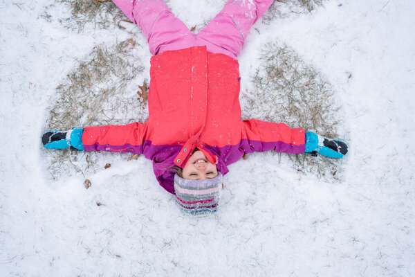 Children Sledding Together on a Snowy Winter Day