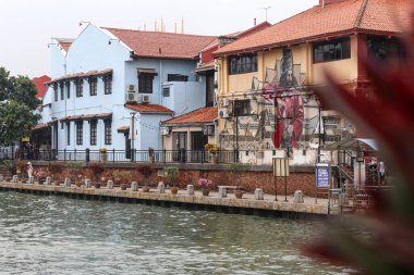 Urban art on buildings next to Melacca river
