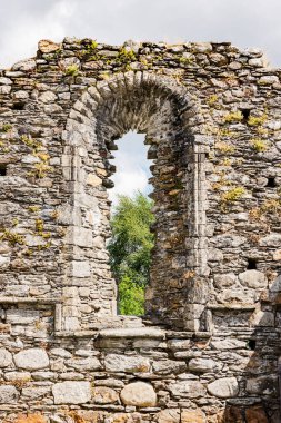 Stone arch ruins of medieval monastery at Glendalough, Ireland