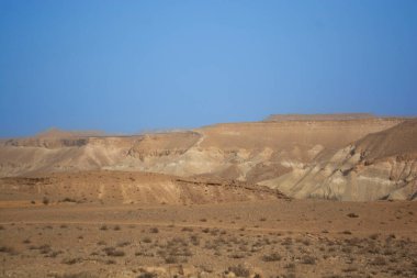 desert landscape against the blue sky