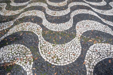 Historic square floor art work with portuguese stones in downtown