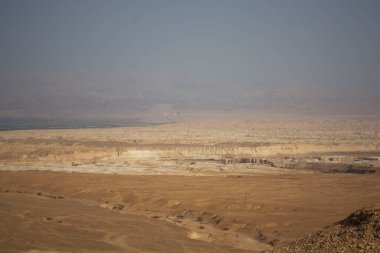 sandy and rocky desert landscape on a clear day