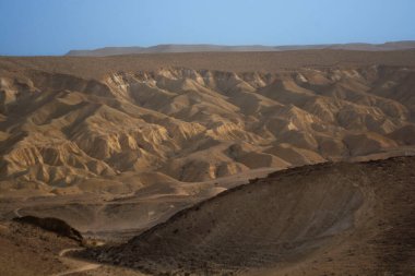 desert landscape against the blue sky