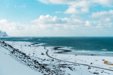 Snowy Coastal Landscape with Ocean View
