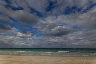 Clouds and white sands of the Caribbean island of Abaco