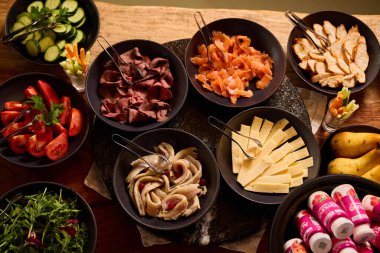 Variety of fresh foods displayed on a rustic wooden table