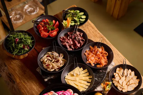 Colorful spread of fresh ingredients at a dining table