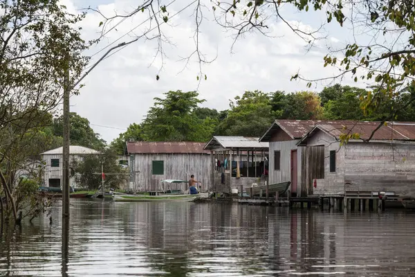 Beautiful view to local houses in flooded forest riverside community