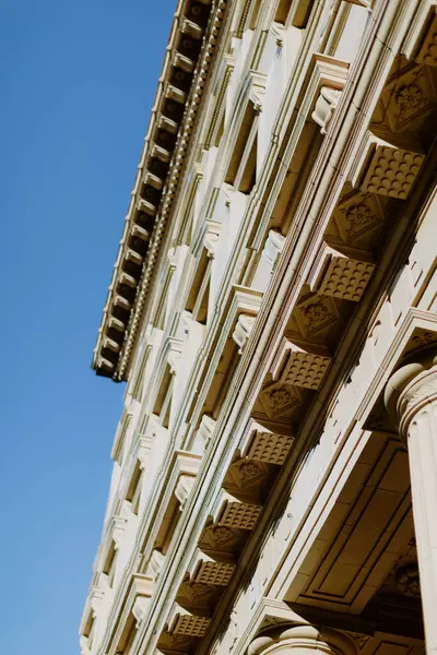 Ornate historic building facade against blue sky