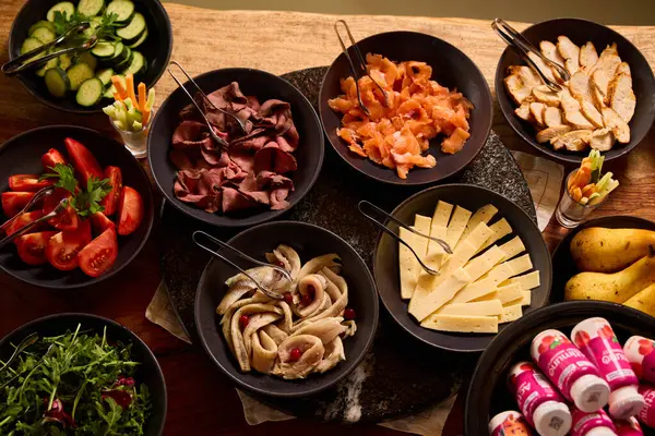 Variety of fresh foods displayed on a rustic wooden table