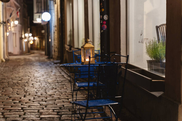 View of a cozy street in the old town of Tallinn, Estonia in the evening