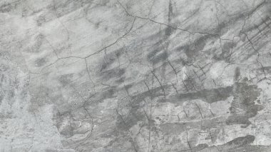 Yaş ve zamanın güzelliğini gösteren yıpranmış, dokulu bir duvar ve zemin..