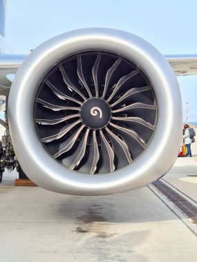 evocative close-up image of an airliner's turbine