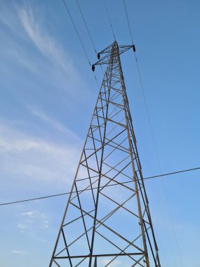 evocative image of a high voltage pylon