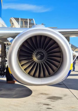 evocative close-up image of an airliner's turbine