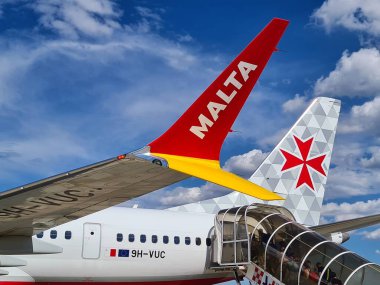 2022.06.07 Milan Malpensa Airport, Malta Air company ofnational flag, evocative image of an airplane waiting for travellersin the parking area