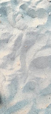 İtalya 'da bir kumsalın kum taneciklerinin anımsatıcı görüntü dokusu