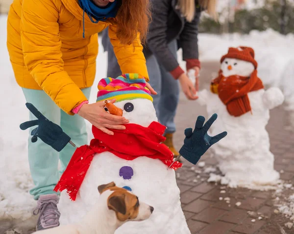Two Faceless Caucasian Women Making Snowman Girlfriends Have Fun Winter — Stock Photo, Image