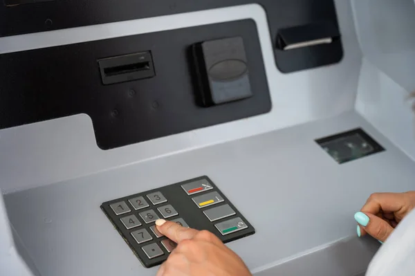 stock image Caucasian woman buying tickets from the machine