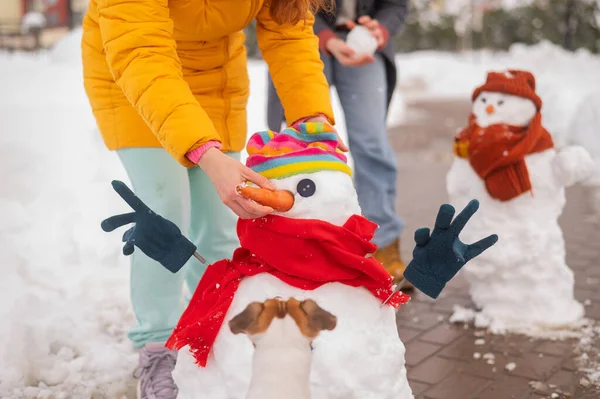 Two Faceless Caucasian Women Making Snowman Winter Fun — Stock Photo, Image