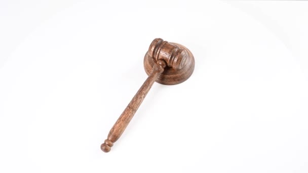 Wooden Judges Gavel Spinning White Background Top View — Stock Video