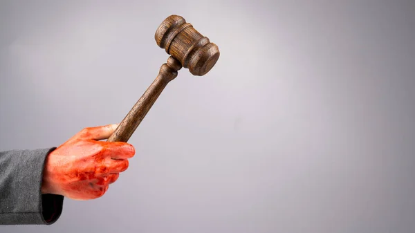 Female Judge Holds Gavel Bloody Hand White Background Copy Space — Stock Photo, Image