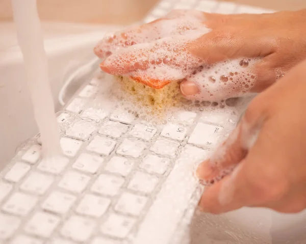 Woman Washing White Computer Keyboard Sponge Foam — Stockfoto