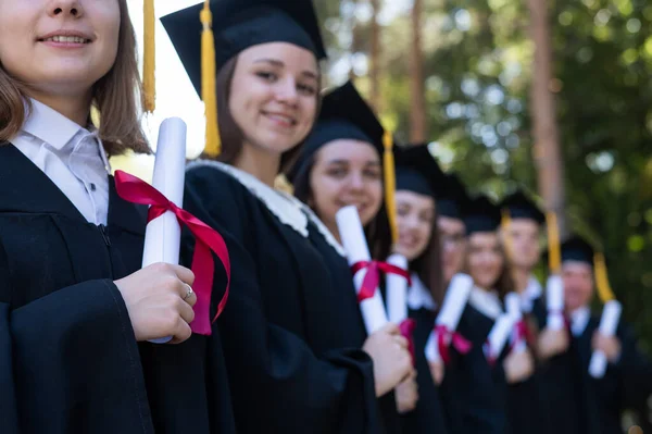 Row Young People Graduation Gowns Outdoors Age Student — Stock Photo, Image