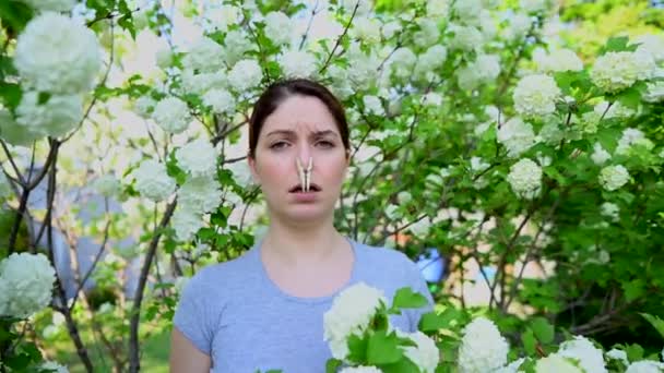 Unhappy Woman Stands Clothespin Her Nose Flowering Tree Allergy — Stock Video